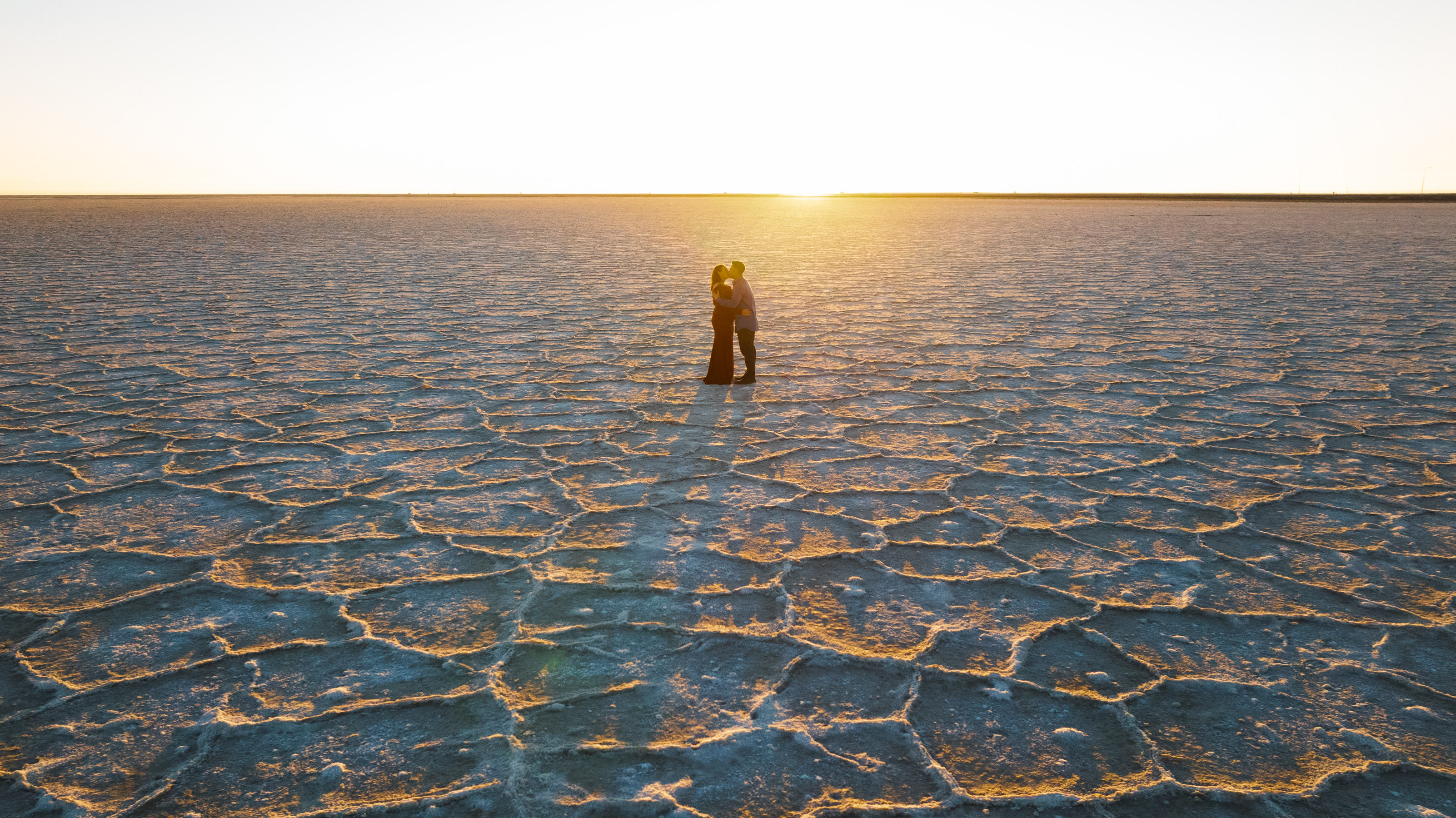 Aerial view of a couple on the salt flats